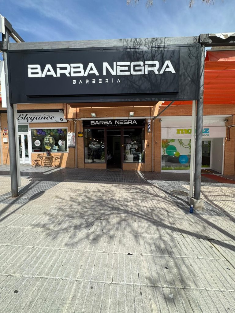 A storefront featuring a sign that reads "Barba Negra," indicating the name of the shop.